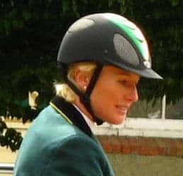 Woman rider wearing helmet