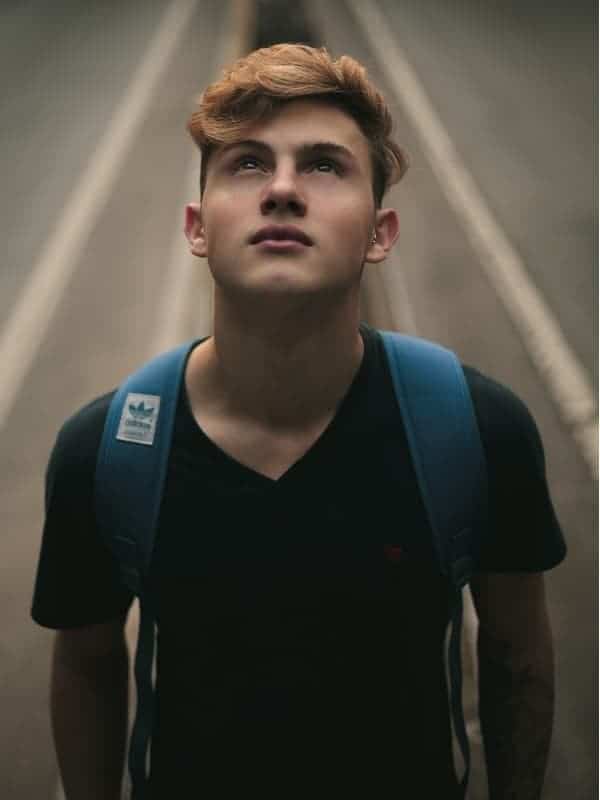 How To Look Cool Wearing A Skateboard Helmet 2 Young man looking up