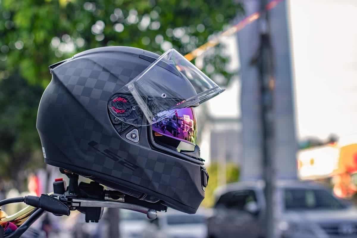 Best Motorcycle Helmets for big heads sitting on a motorcycle.