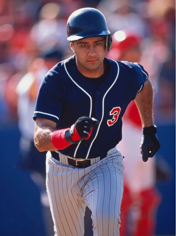 Baseballer wearing blue helmet running