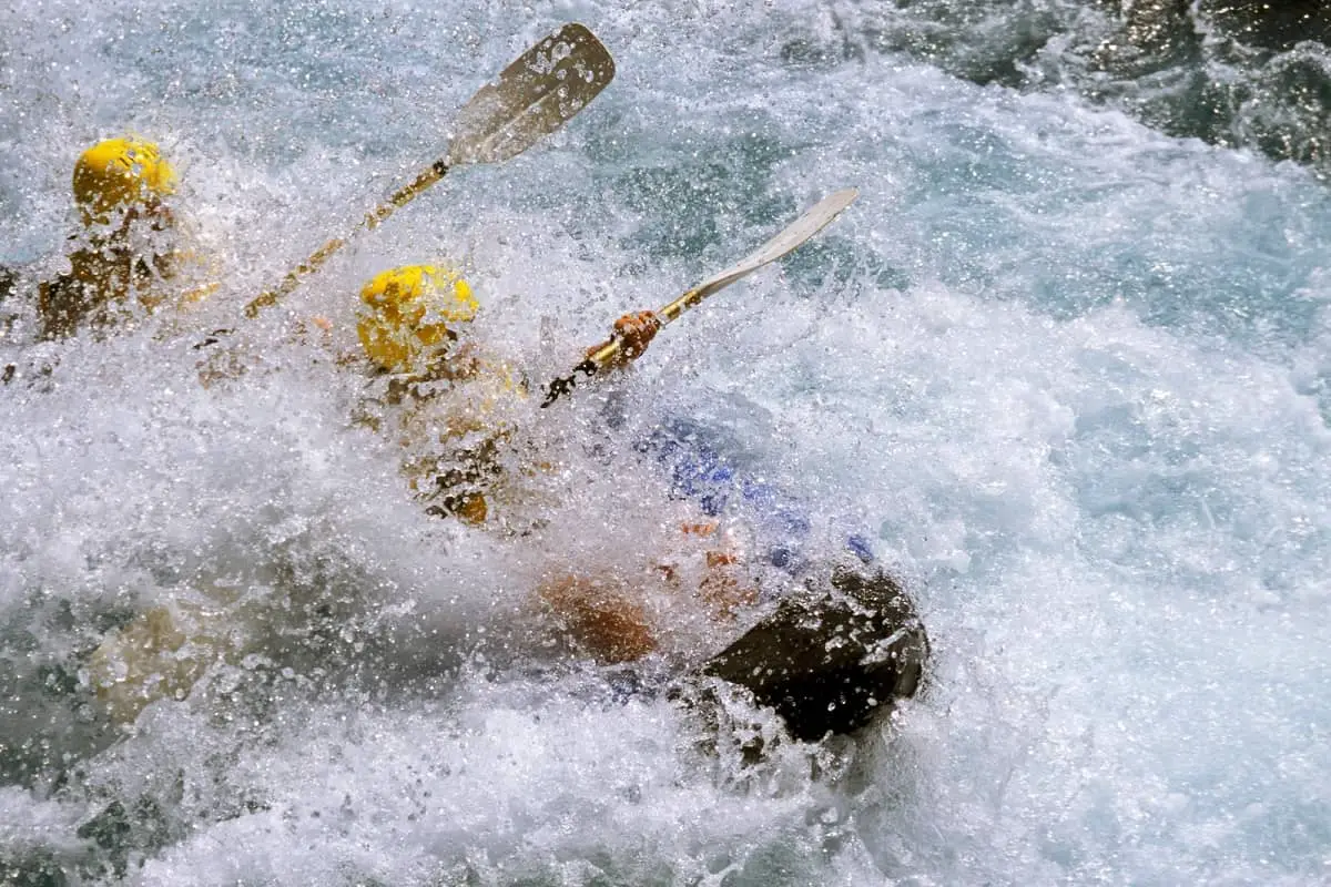 Kayakers in white water rapids