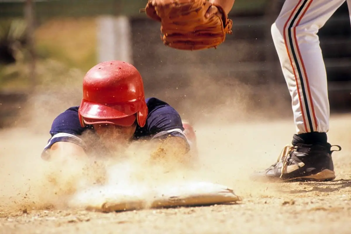 Baseball player slides to base