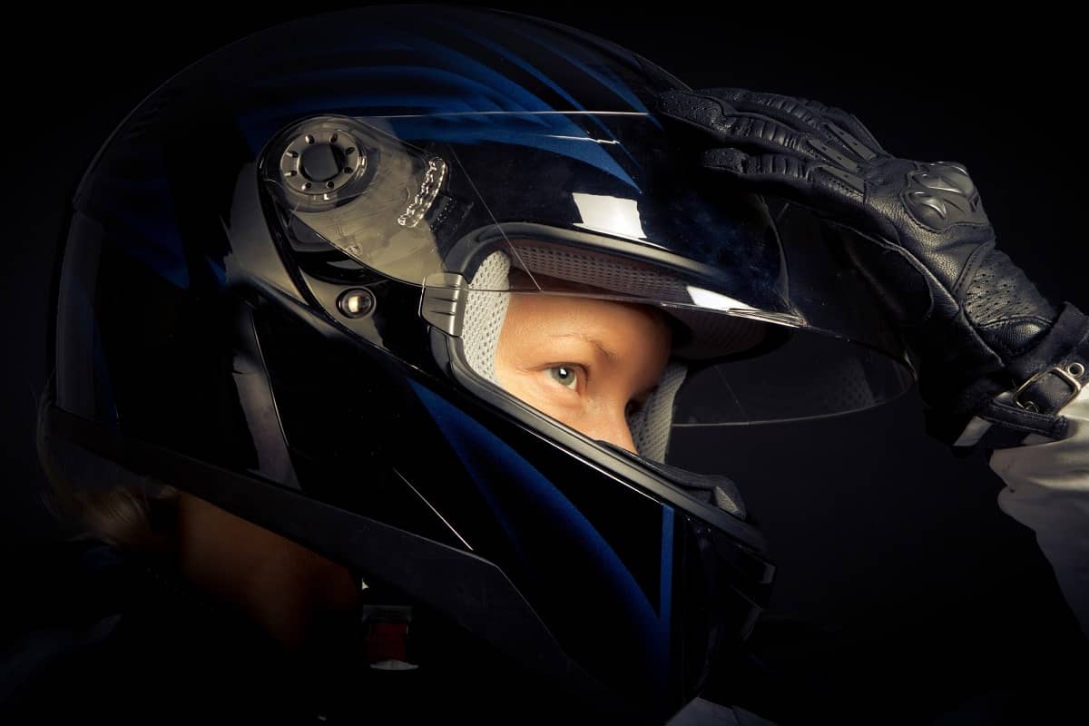 Young man wearing motorcycle helmet