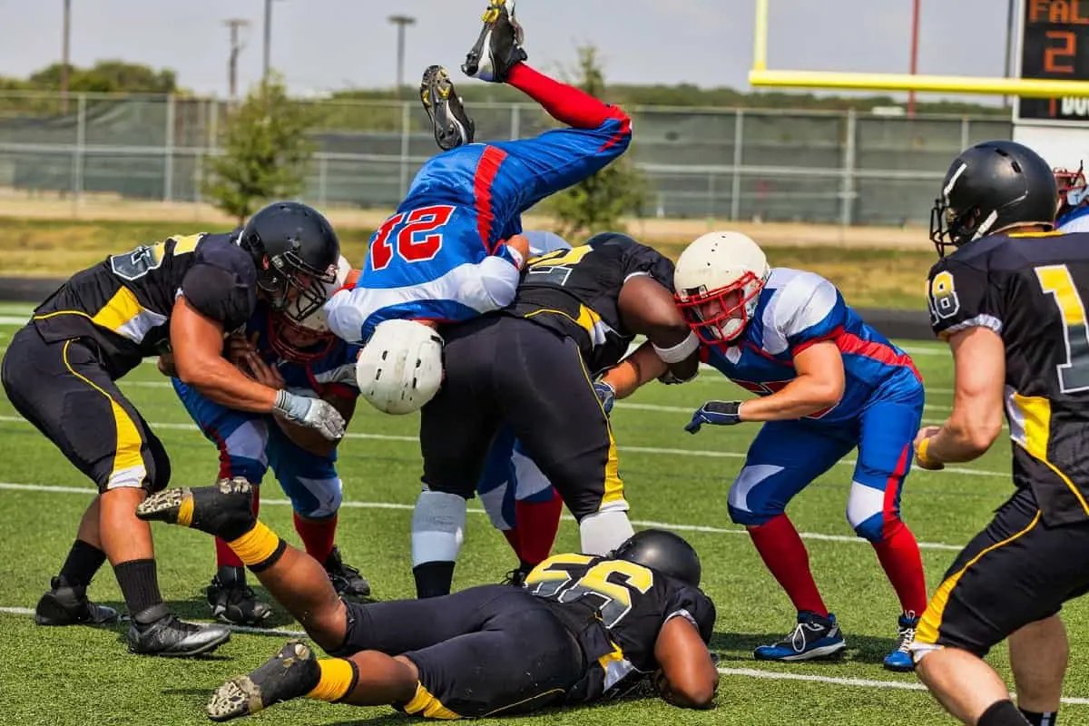 How do helmets protect football players.  In tackles like these helmets prevent a lot of facial injuries.