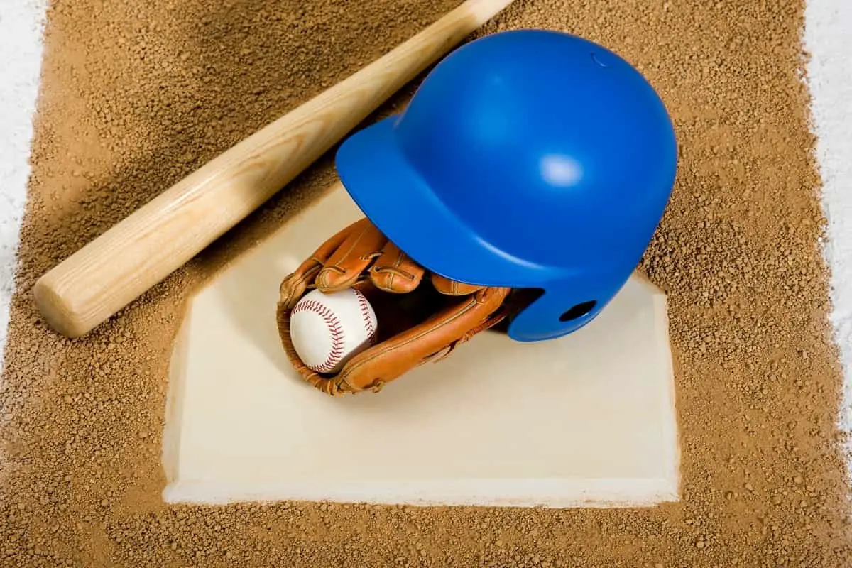 modern blue baseball helmet with ball, mitt, and bat