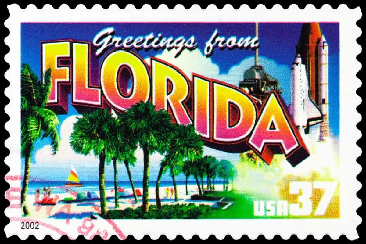 Nice place, but, does Florida have a helmet law? Greetings from Florida postage stamp from 2002.