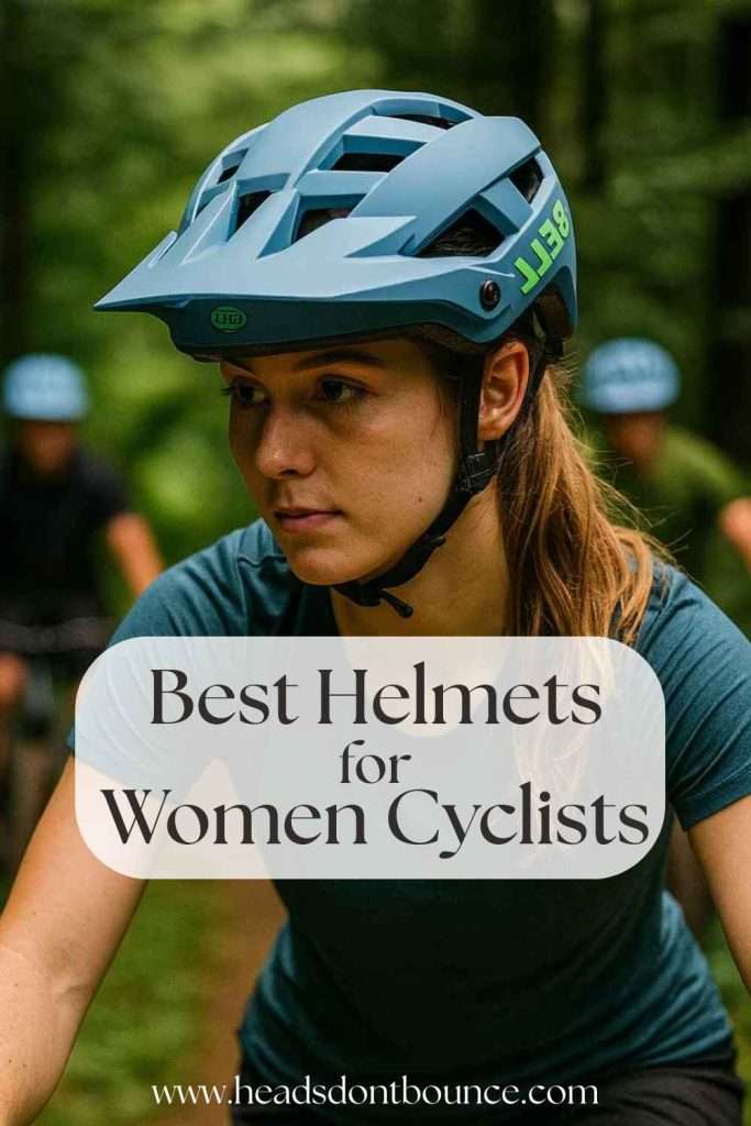 Female mountain biker wearing a blue helmet.